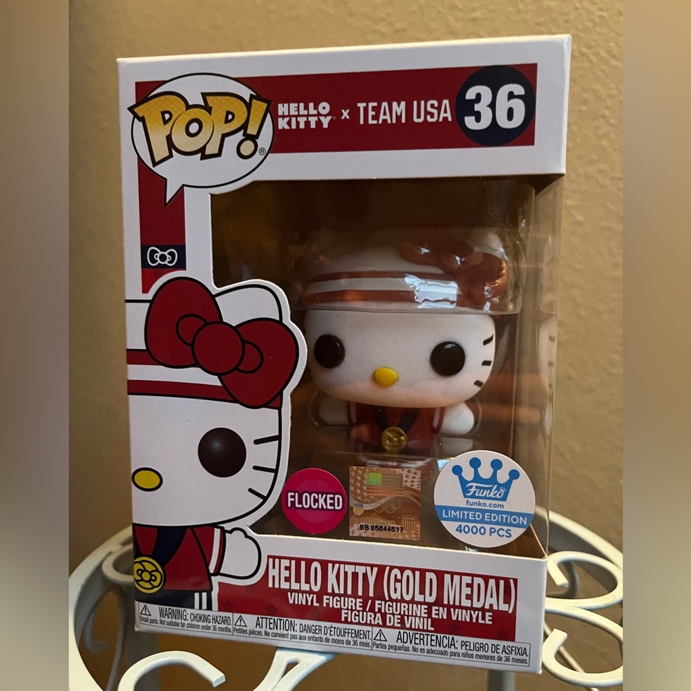 Flocked Hello Kitty Gold metal Funko Pop!